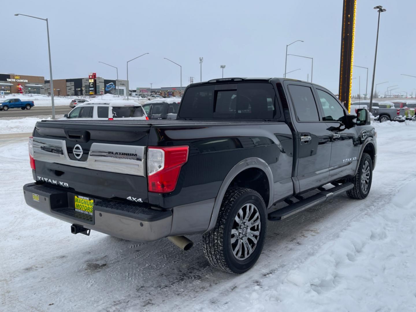 2016 Black /black leather Nissan Titan XD PLATINUM RESERVE 4WD (1N6BA1F46GN) with an 5.0L V8 DOHC 32V DIESEL engine, 6A transmission, located at 1960 Industrial Drive, Wasilla, 99654, (907) 274-2277, 61.573475, -149.400146 - Photo#3